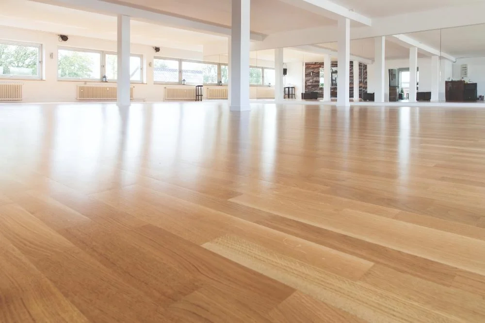 Sprung Wood Sports Flooring in Bognor Regis: A Complete Comparison with Sprung Vinyl Wood Systems